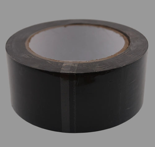 Black line marking tape laying flat.