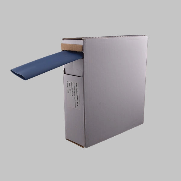 A white box containing 2:1 blue heat shrink. This is a mini-reel of blue heat shrink tubing.