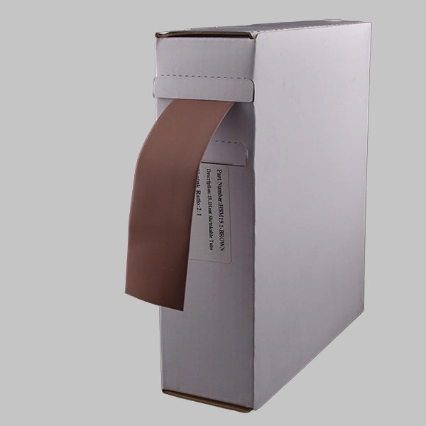 A white box containing 2:1 brown heat shrink. This is a mini-reel of brown heat shrink tubing, often used to denote live wires, especially in single-phase electrical systems.