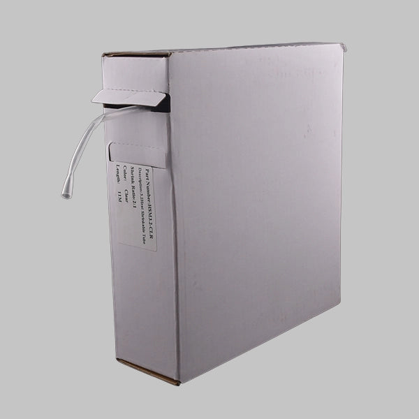 A white box containing 2:1 clear heat shrink. This is a mini-reel of clear heat shrink tubing, ideal for identifying cable marking under it.