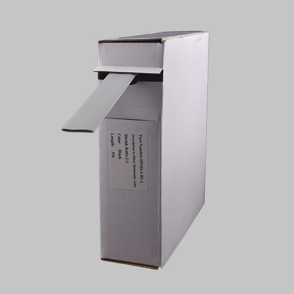 A white box containing 2:1 grey heat shrink. This is a mini-reel of blue heat shrink tubing, often used to identify neutral cables