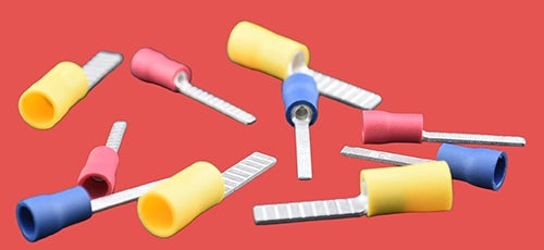 Assorted insulated blade terminals in red, blue, and yellow.