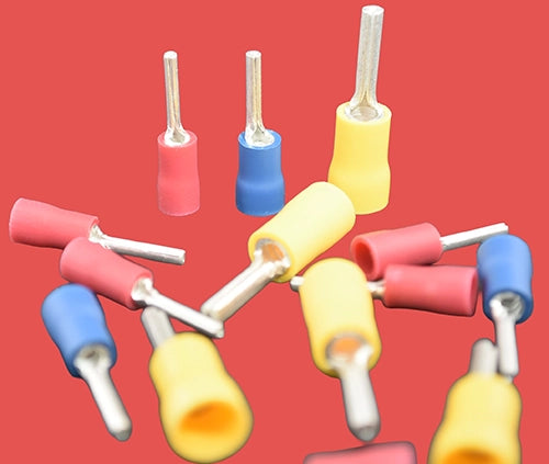 Assorted pre-insulated pin crimps in red, blue, and yellow.