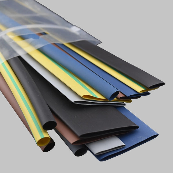 This image shows a mixed pack of electrical heat shrink tubing. This pack contains 15 pieces of heat shrink, 1 piece of: 6.4 mm; 12.7 mm & 25.4 mm in the following colours: black, brown, blue, grey & green/yellow