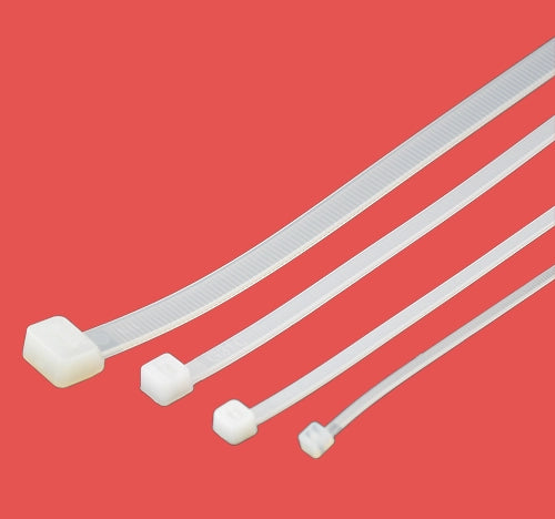 Set of natural cable ties laid out in increasing size order