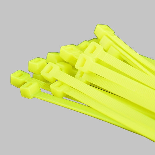 Neon green cable ties bundle on grey background - fluorescent green zip ties for safety marking and industrial applications