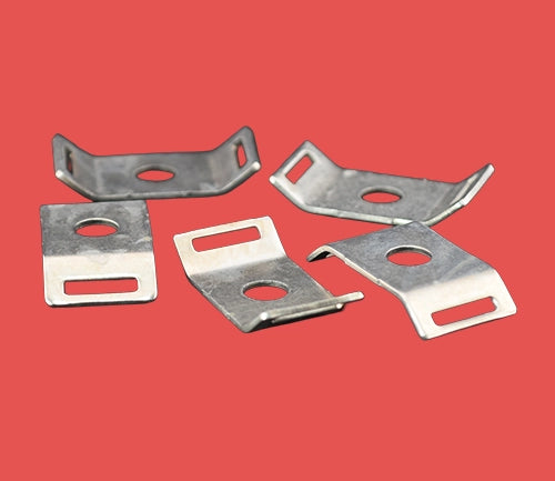 Group of five stainless steel cable tie mounts for heavy-duty cable fastening and secure mounting on flat surfaces