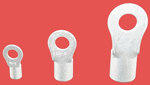 Rear view of three uninsulated ring terminals showing crimp barrel detail in small, medium, and large sizes