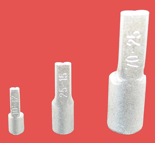 Three  copper pin terminals in different sizes, laying flat with pin ends facing the camera.