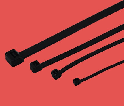 Black nylon zip ties laid flat to show head and strap detail