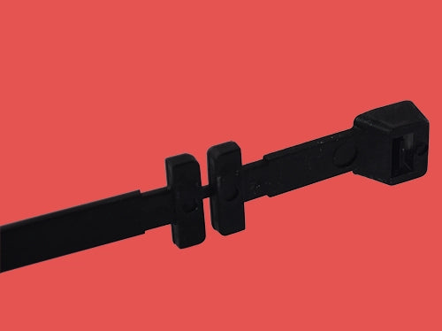 Side profile of a cable tray fixing tie focusing on the fixing clip and robust tie head for electrical tray setups