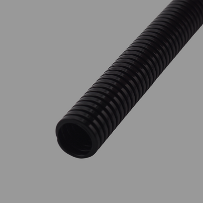 End view of black flexible nylon conduit showing smooth internal bore and ribbed exterior