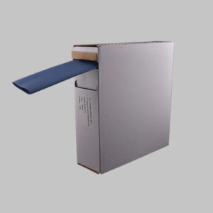 A white box containing 2:1 blue heat shrink. This is a mini-reel of blue heat shrink tubing.