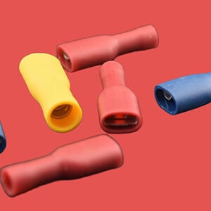 Assorted fully insulated female spade connectors in red, blue, and yellow.
