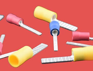 Assorted insulated blade terminals in red, blue, and yellow.
