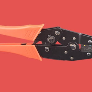 A black and orange heat shrink crimping tool with polypropylene handles.