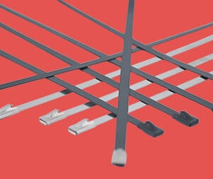 Flat lay of uncoated, PVC coated, and epoxy coated stainless steel cable ties side by side
