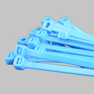 Neon blue cable ties bundle on grey background - fluorescent blue zip ties for cable identification and data centre applications
