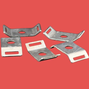 Group of five stainless steel cable tie mounts for heavy-duty cable fastening and secure mounting on flat surfaces